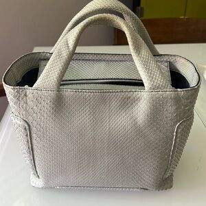 Iris Noble bag -Kayla 26 in Griffin color in all Python.